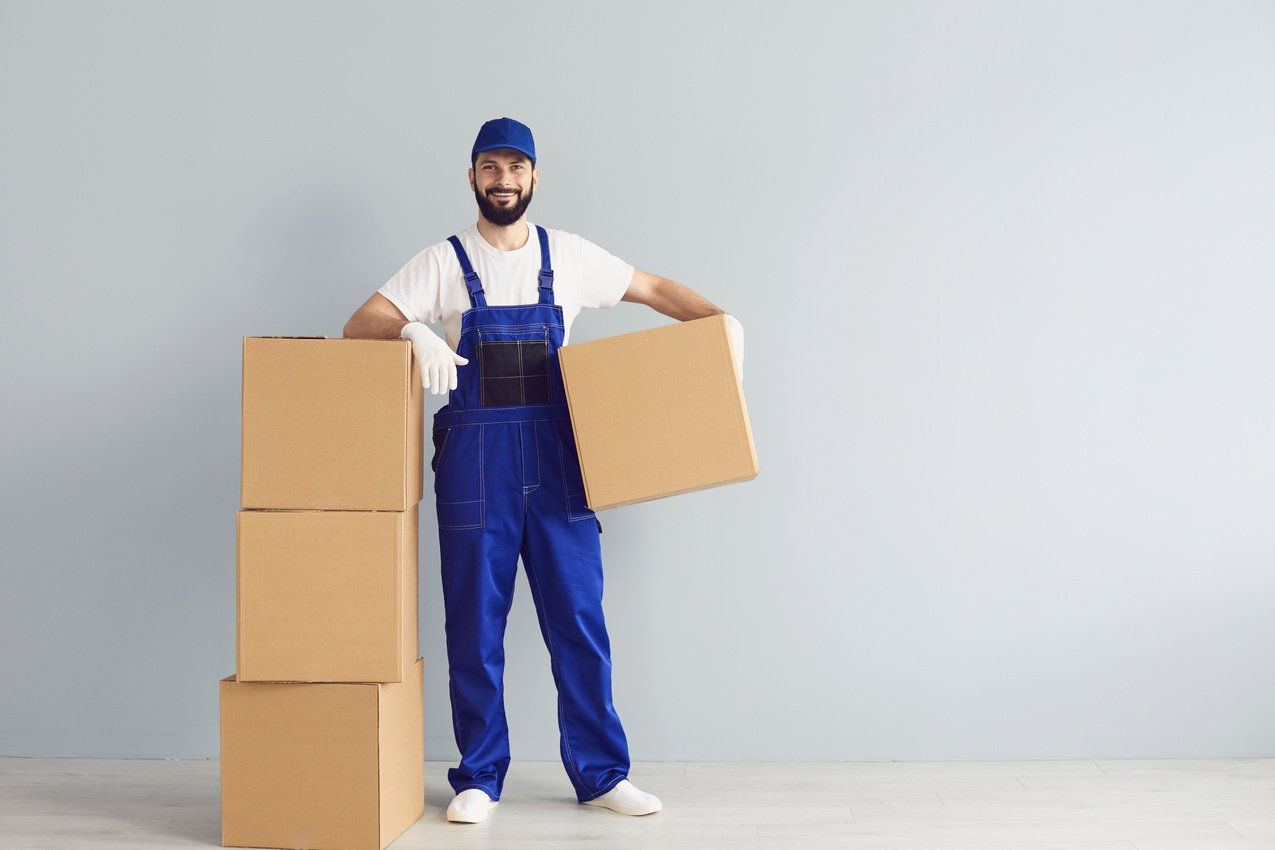 Happy Delivery Man with Boxes